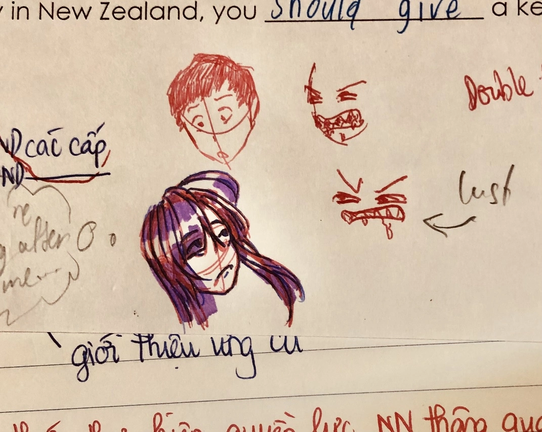 A doodle that was apparently drawn with a red ballpoint pen, a purple highlighter and a blue ballpoint pen.